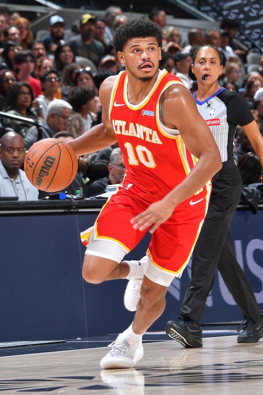 RayJ Dennis driving to the basket for the Atlanta Hawks